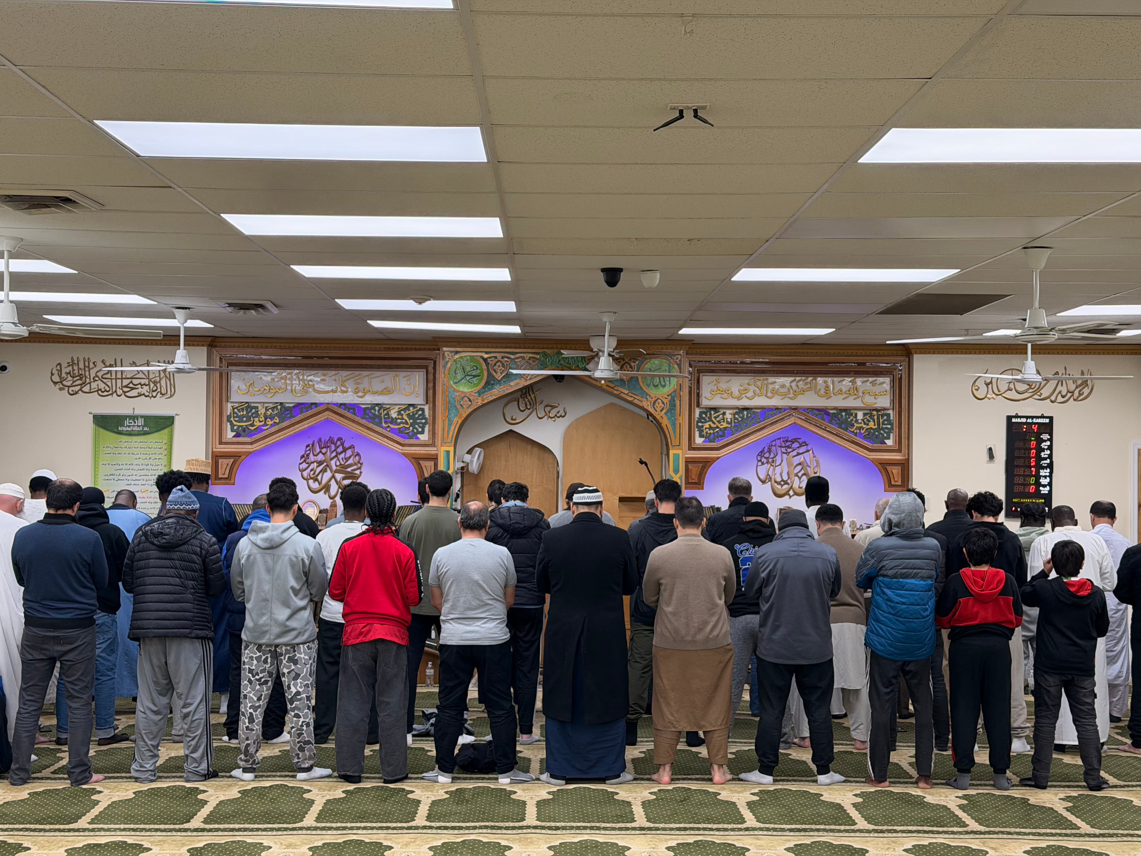 Muslims praying at the masjid