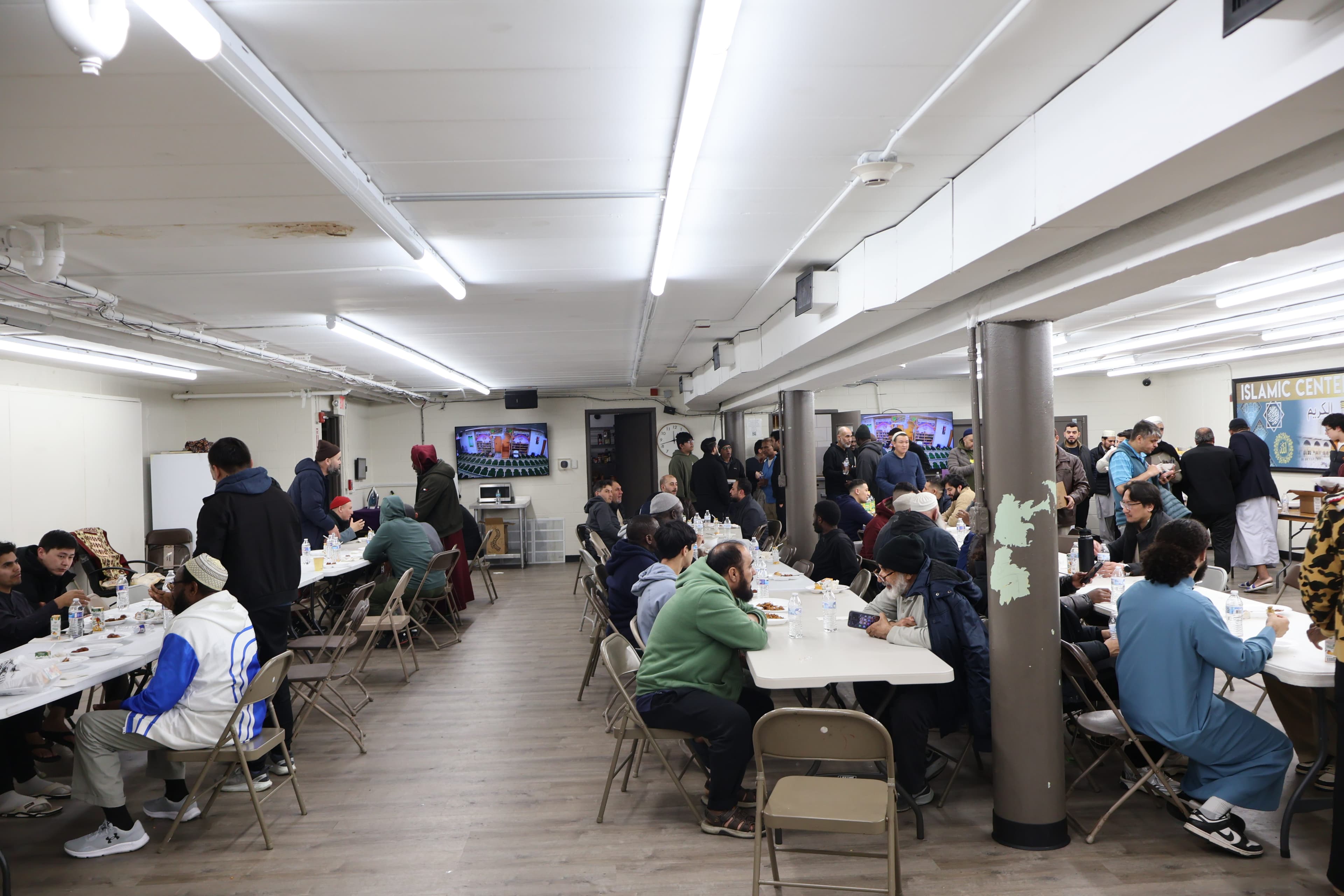 Community gathered in the masjid dining room